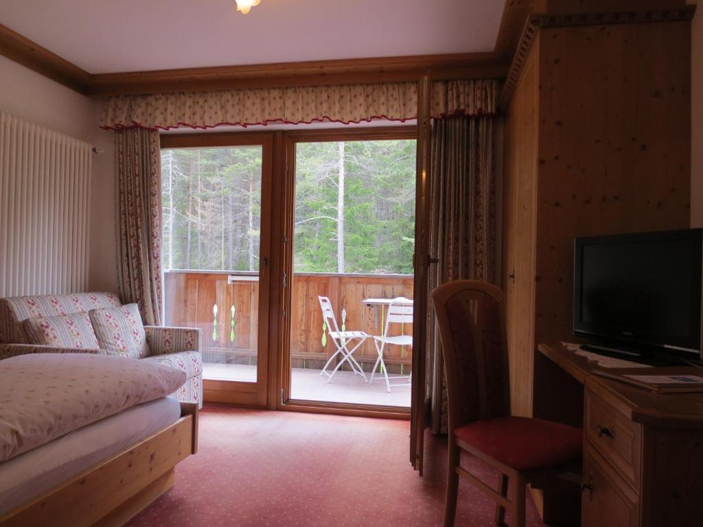 Hotel Ciasa Ai Pini San Cassiano (Badia) Quarto foto